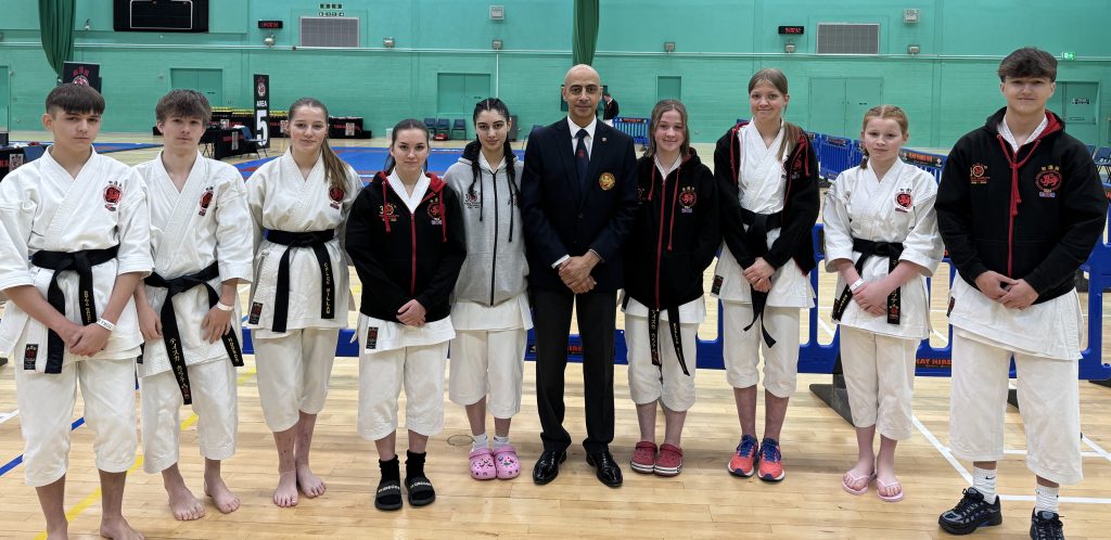 Black Belts with Sensei before the 2025 National Black Belt Championships
